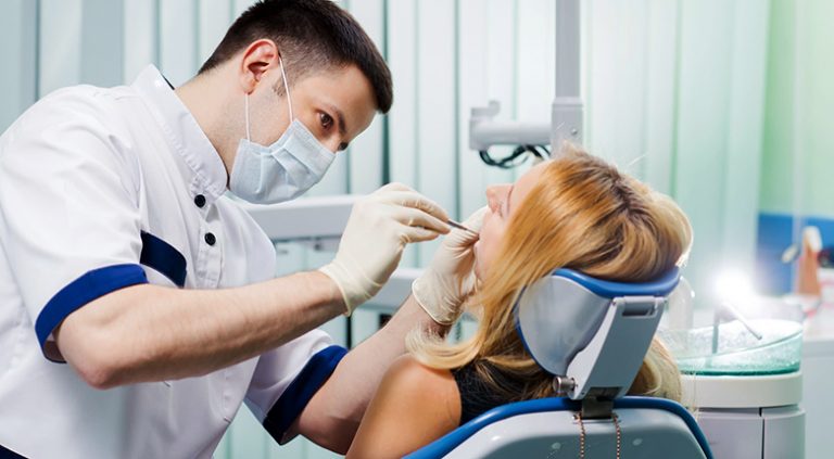 Осмотр у врача-стоматолога